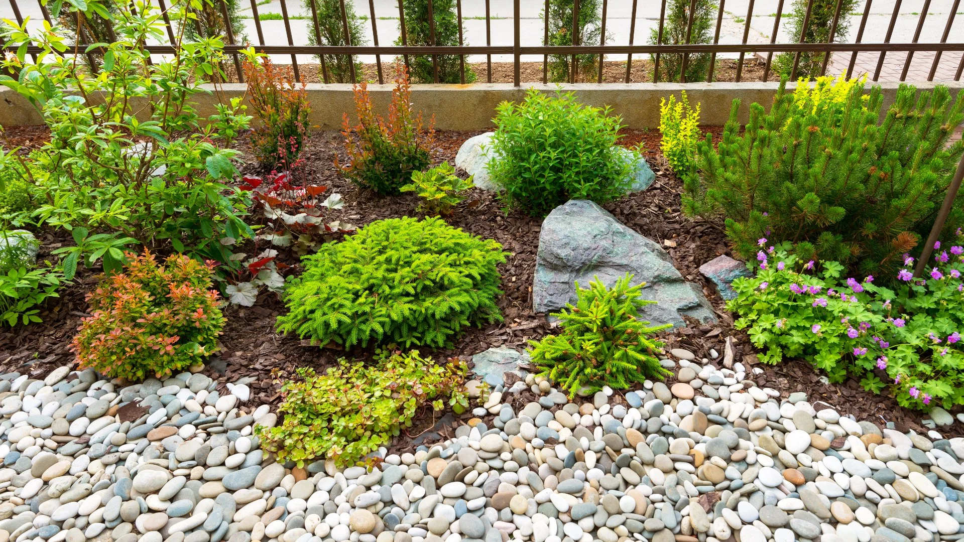 Should I Use a Mulch or Rock Ground Cover for My Landscape Beds?