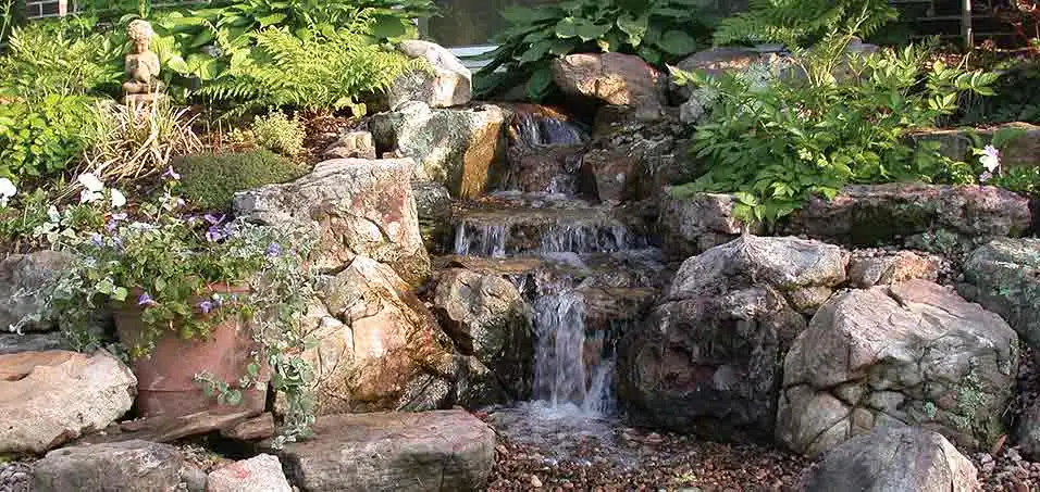 A well-designed waterfall that was perfectly integrated into this Ankeny property.