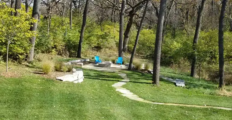 A well maintained Granger, IA back yard with lawn care services.