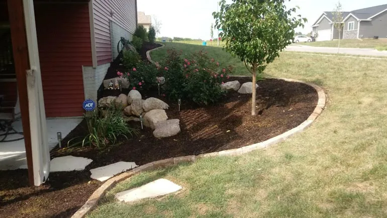 Softscape design and installed by our team at a home in Urbandale, Iowa.