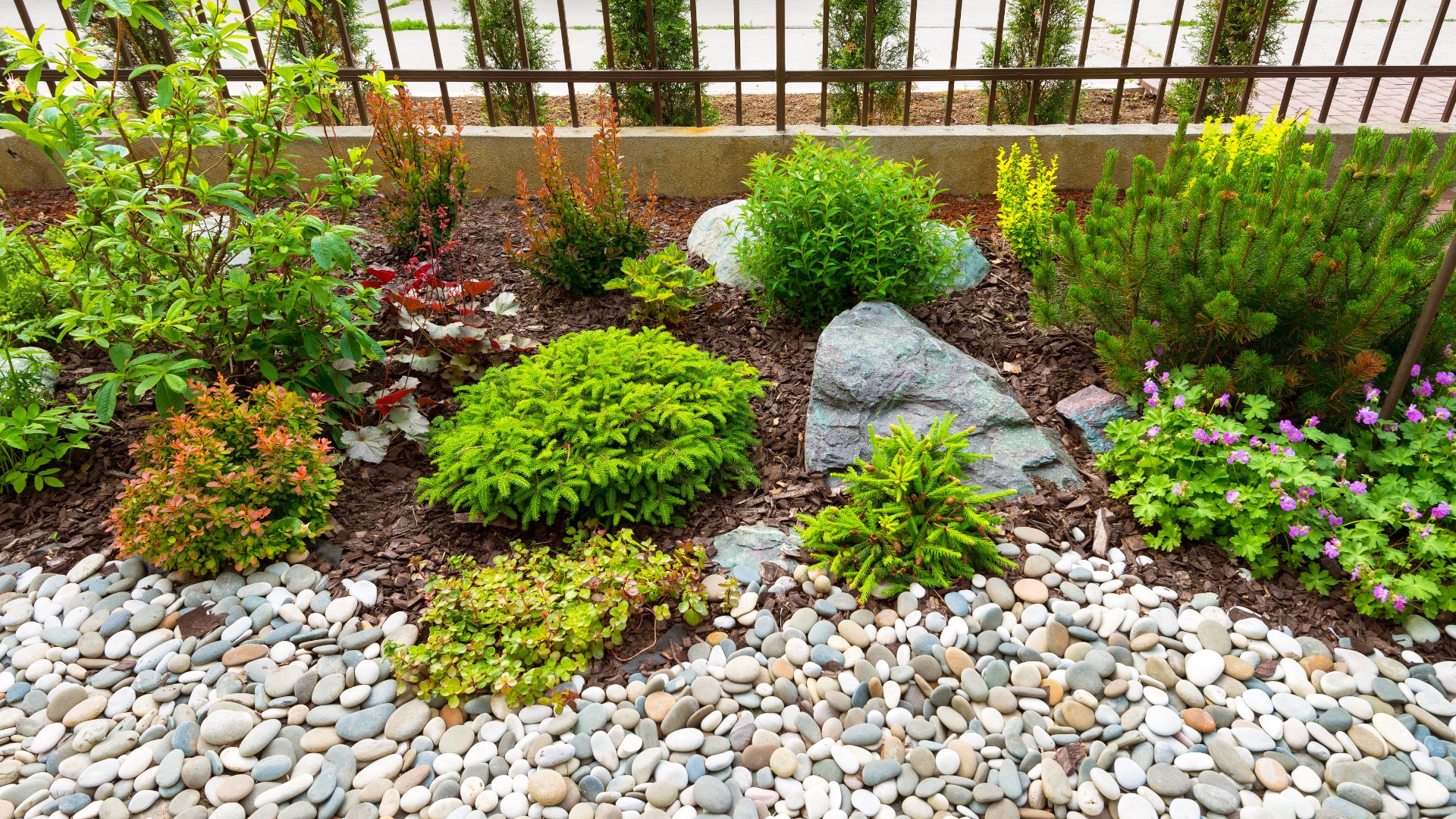 Should I Use a Mulch or Rock Ground Cover for My Landscape Beds?