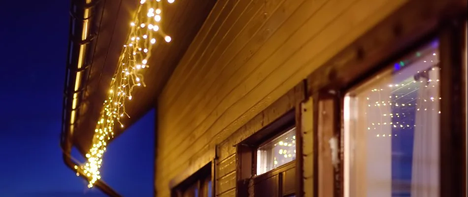Holiday lights along the gutter of a house in Des Moines, IA.