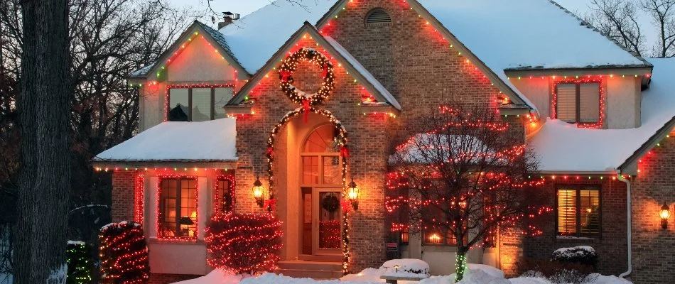 House in Des Moines, IA, decorated with colorful holiday lights.