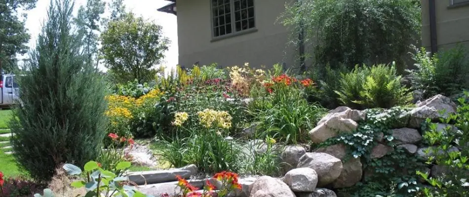 Landscape in Des Moines, IA, with colorful flowers and plants.