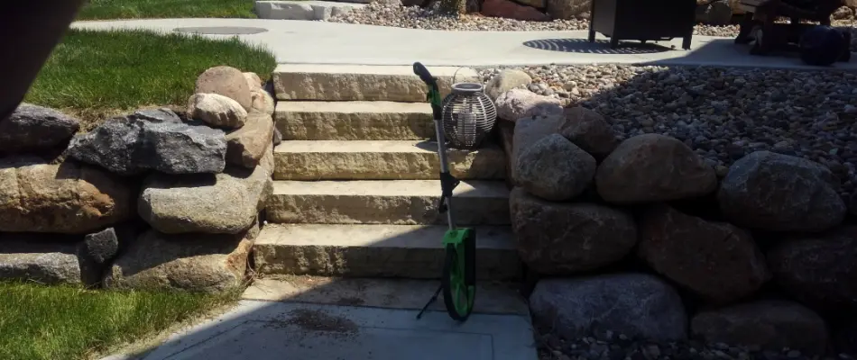 Outdoor steps between retaining walls in Des Moines, IA.