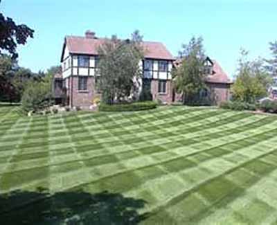 The homeowner of this property in West Des Moines is taking advantage of the fertilization program of A+ Lawn & Landscape.