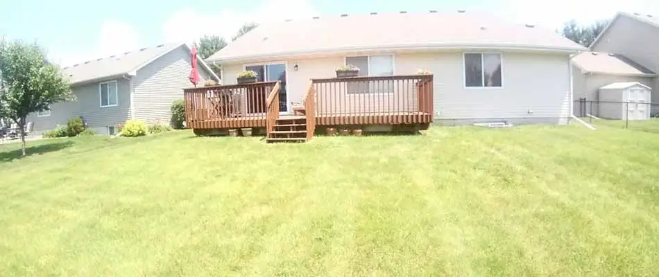 Freshly mowed and maintained home lawn in Carlisle, IA.
