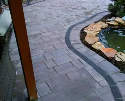Custom paver patio and walkway construction in West Des Moines, IA.