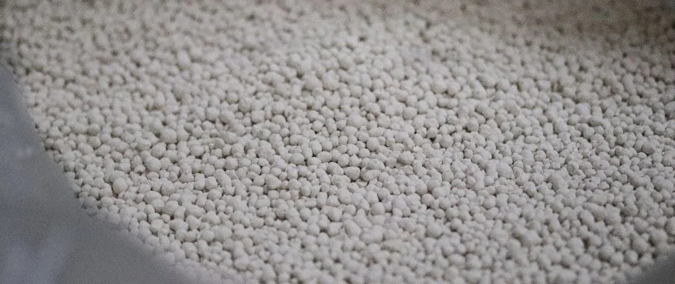 Bag full of lime pellets intended for a lawn in Des Moines, IA.