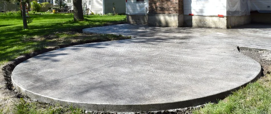 Concrete patio on a property in Des Moines, IA.