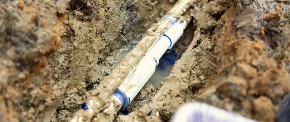 Damaged pipe in the ground in Des Moines, IA.