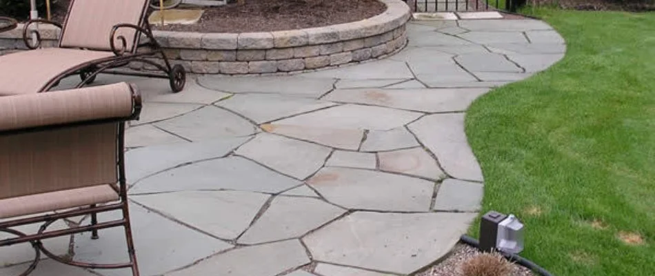 Flagstone paver patio on a property in Des Moines, IA.