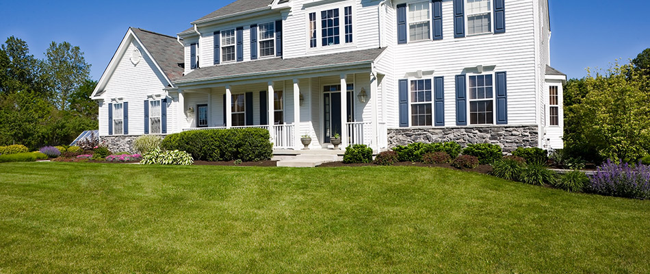 A home with a healthy lawn in Des Moines, IA. 